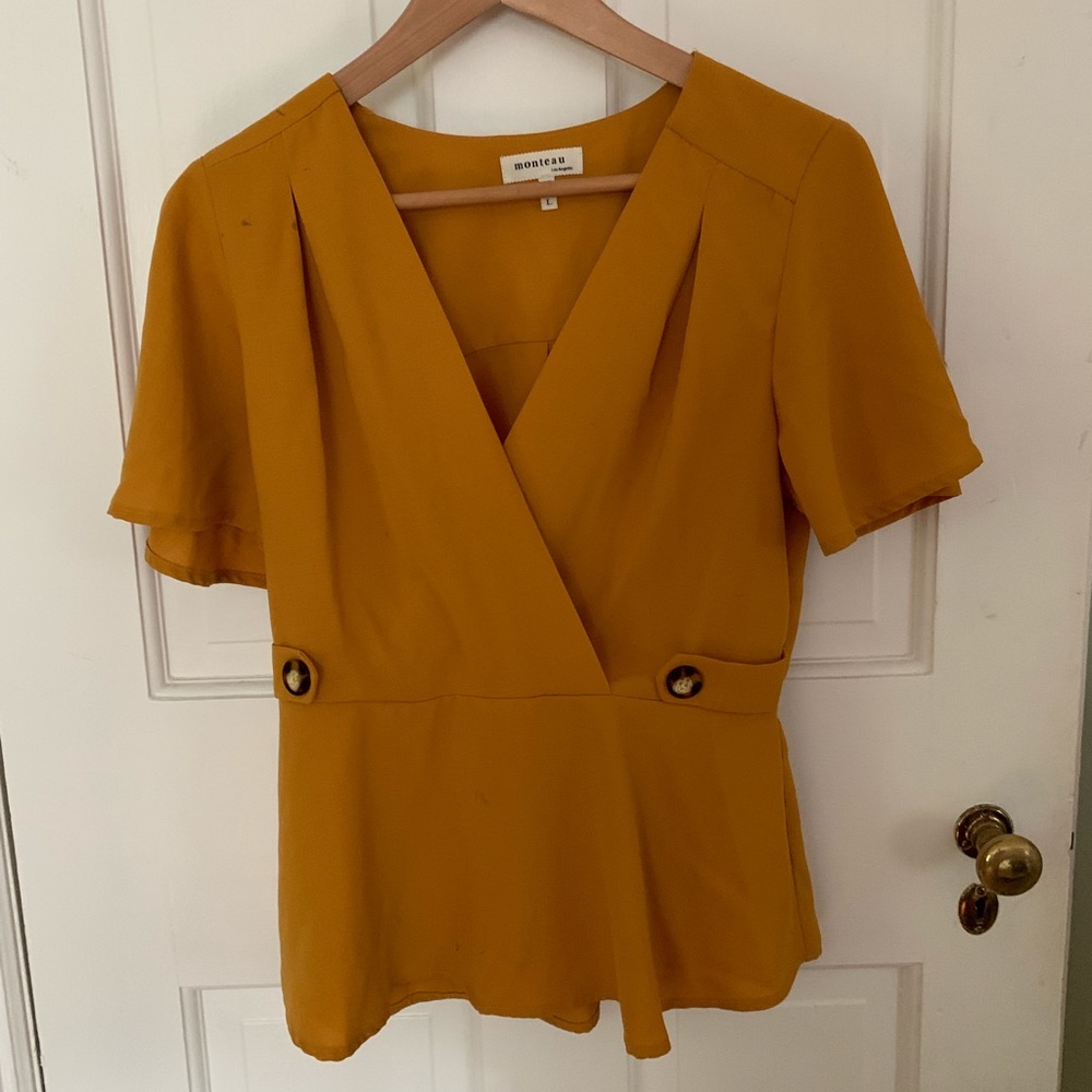 Super cute flutter sleeve shirt!